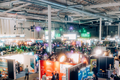 Vogelperspektive der Messe Hamburg Open mit zahlreichen Ständen und Besuchern, die das Geschehen erkunden.